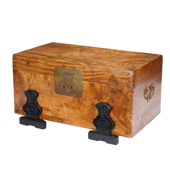Chinese camphor wood trunk on ebonized hardwood stand (c. 1820)