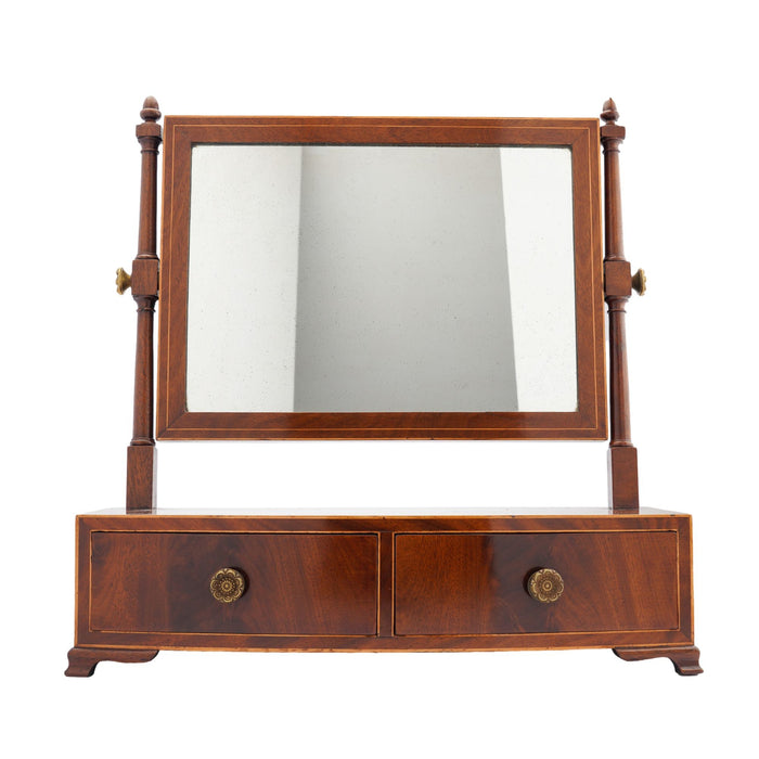Rectangular mahogany dressing mirror on a bow front stand with drawer (c. 1790)