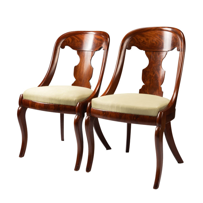 Pair of American mahogany gondola chairs (c. 1815-35)