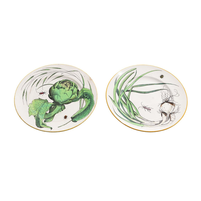 Pair of French glazed faience plates with scallions and artichokes (c. 1850's)