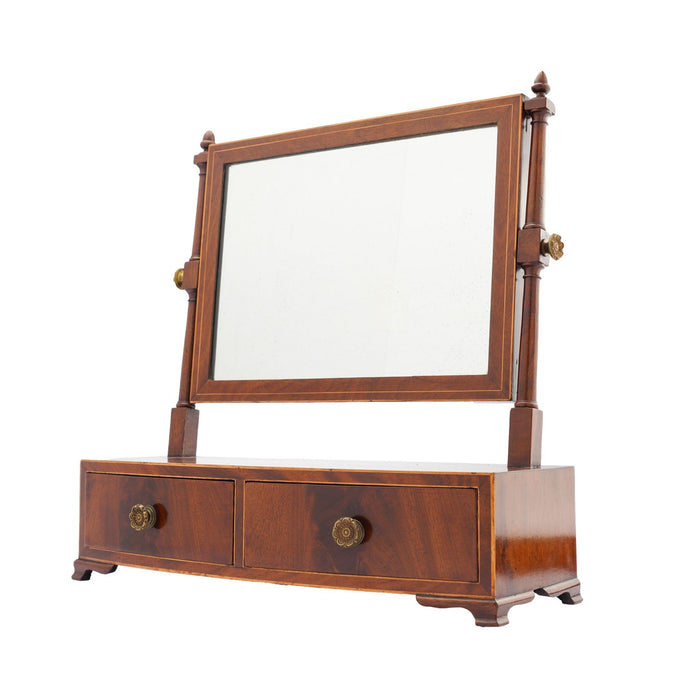 Rectangular mahogany dressing mirror on a bow front stand with drawer (c. 1790)