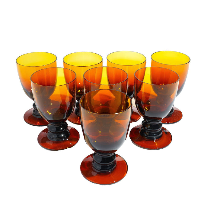 Set of eight amber glass pedestal rummers (c. 1950)