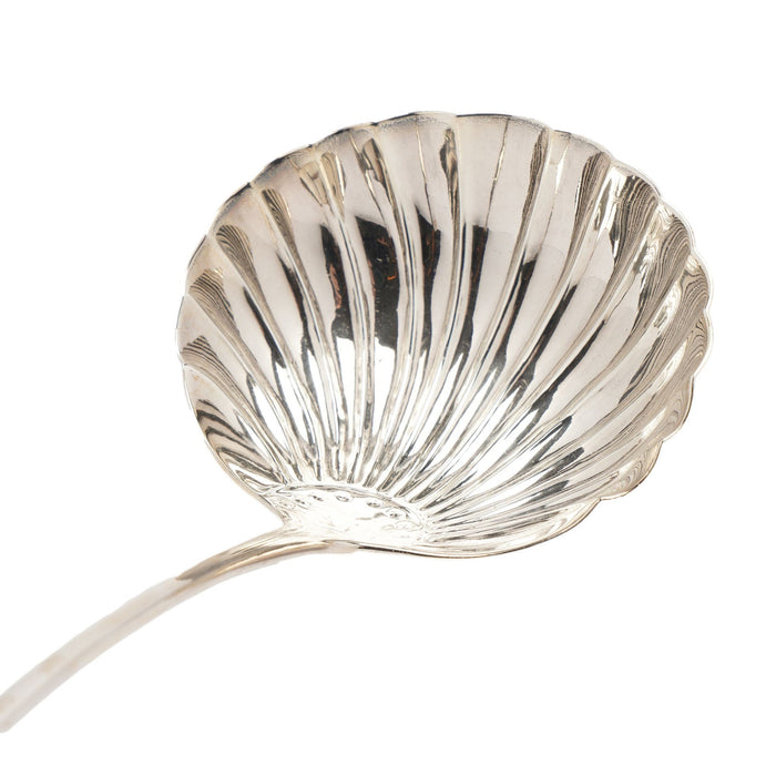 English Georgian shell form ladle in sterling silver (c. 1700's)