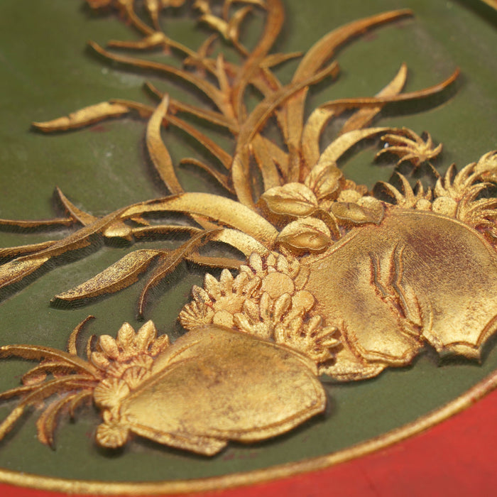 Chinese wood panel with a shallow carved and gilt cartouche on a red lacquer ground (1800's)