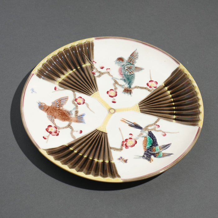 Polychrome glazed Argenta majolica plate by Wedgwood (c. 1884)