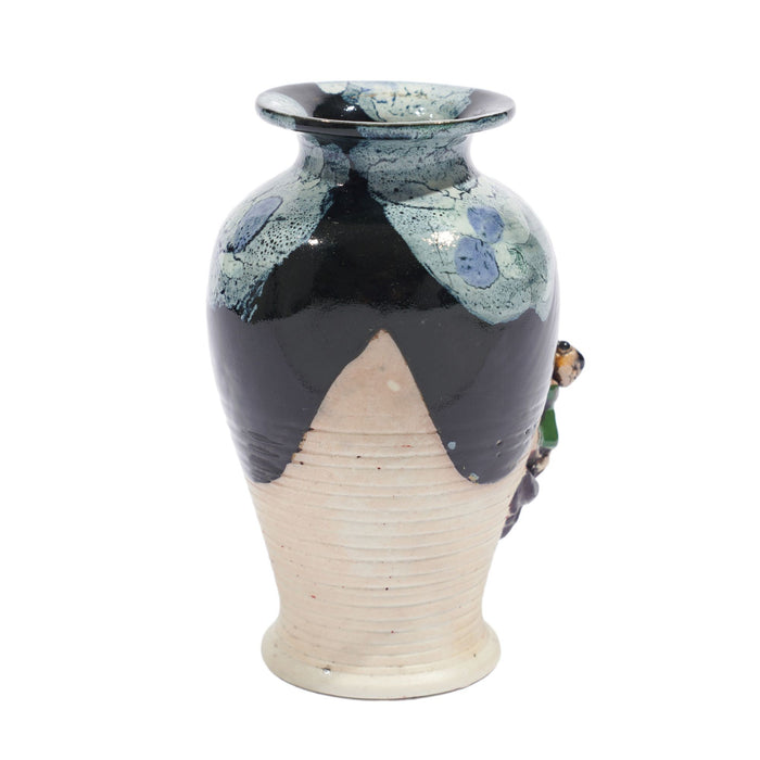 Japanese Sumida Gawa vase with a climbing figure (c. 1890)