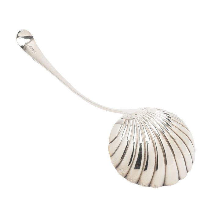 English Georgian shell form ladle in sterling silver (c. 1700's)