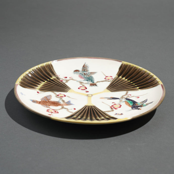 Polychrome glazed Argenta majolica plate by Wedgwood (c. 1884)
