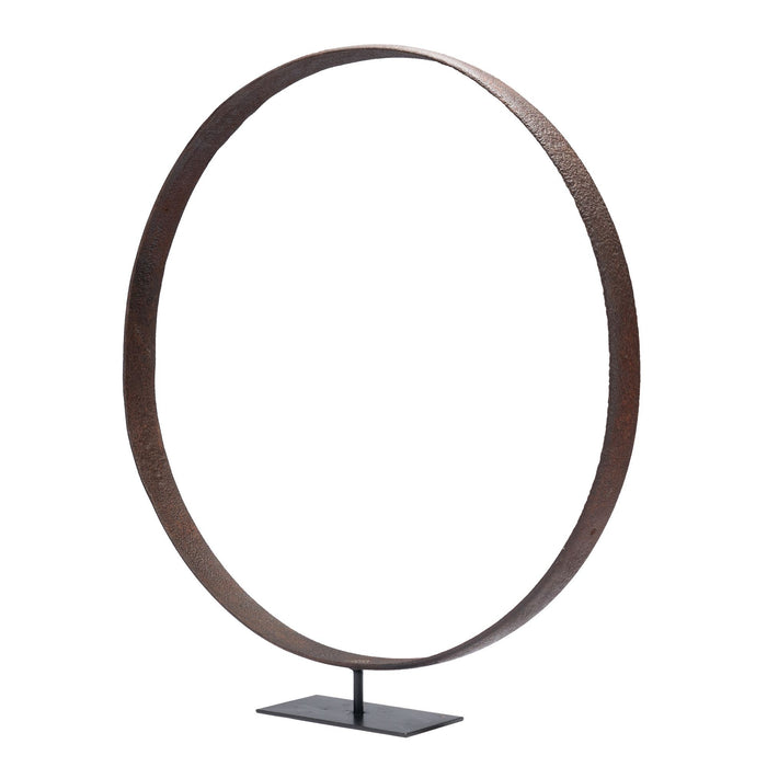 Large forged iron carriage wheel rim mounted on a custom iron stand (1800's)
