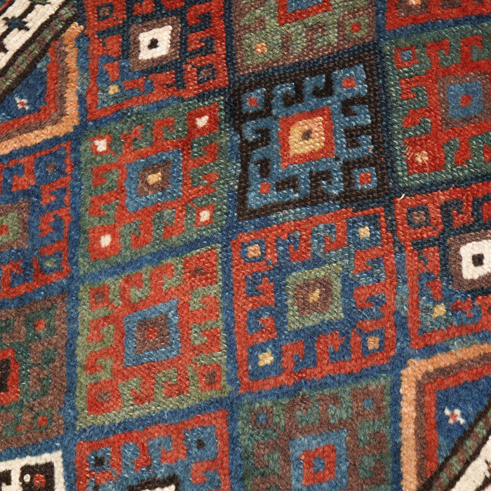 Vintage Balochistan floor pillow with leather back (c. 1890)