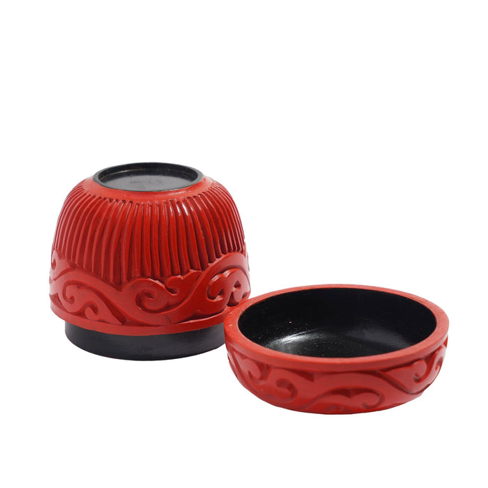 Tapered cylindrical carved cinnabar box (c. 1950)