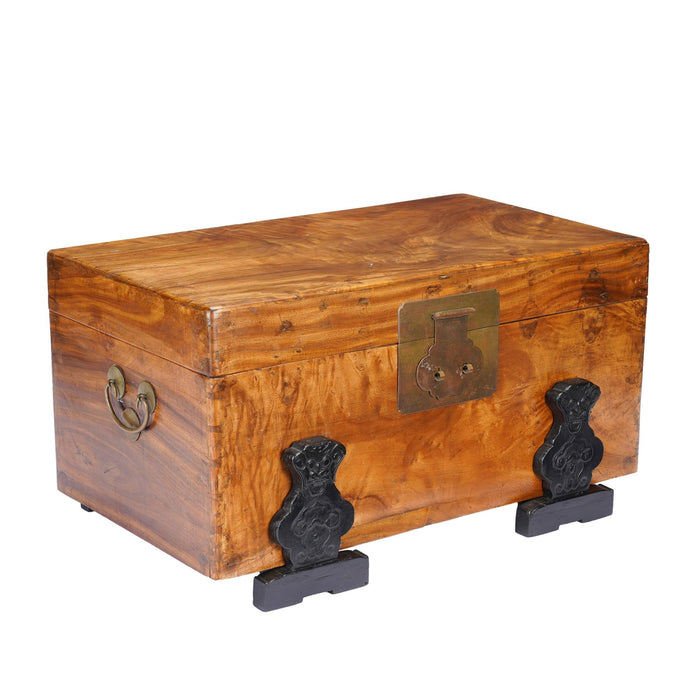 Chinese camphor wood trunk on ebonized hardwood stand (c. 1820)