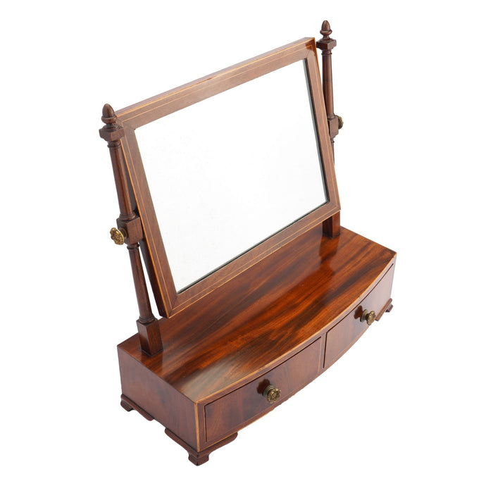 Rectangular mahogany dressing mirror on a bow front stand with drawer (c. 1790)