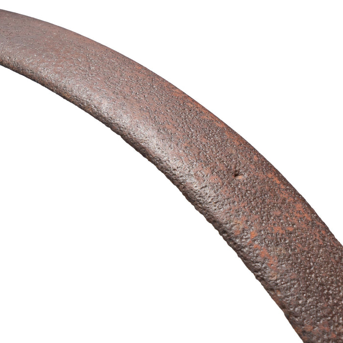 Large forged iron carriage wheel rim mounted on a custom iron stand (1800's)