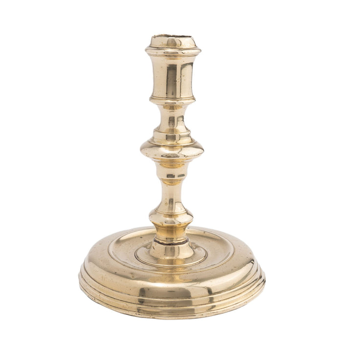 French cast brass circular base candlestick (c. 1720)