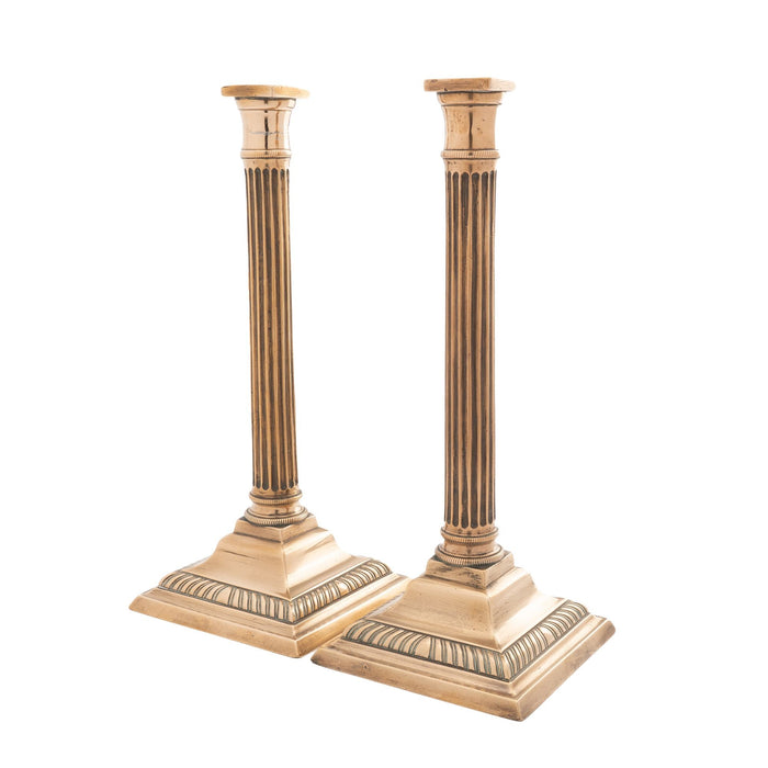 Pair of English cast brass columnar candlesticks (c. 1790)