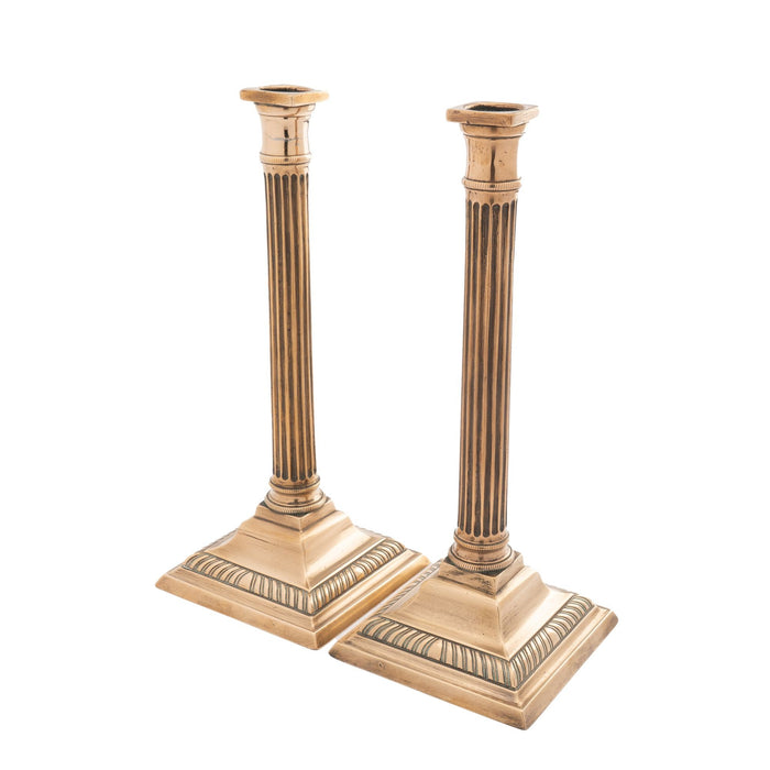 Pair of English cast brass columnar candlesticks (c. 1790)