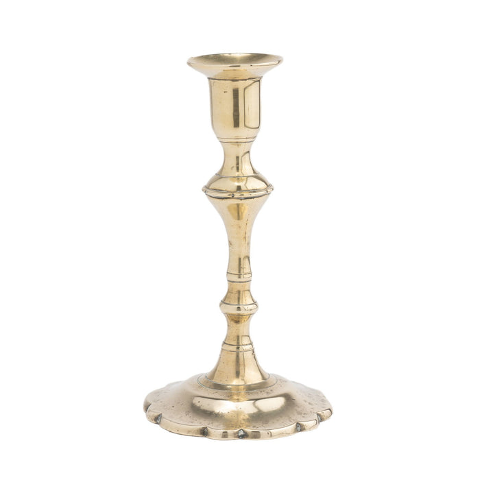 Cast brass Queen Anne petal base candlestick (c. 1760)