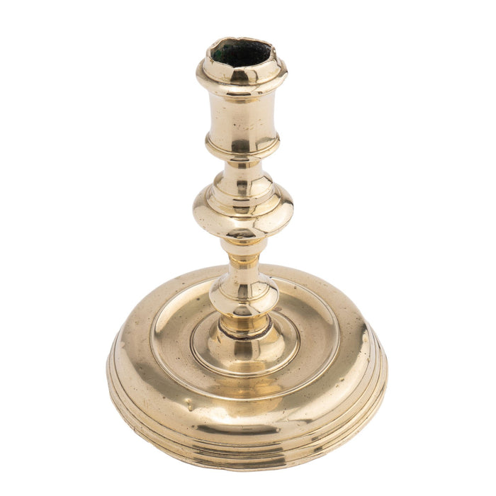 French cast brass circular base candlestick (c. 1720)