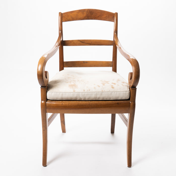 French cherry wood arm chair with rush seat and upholstered seat cushion (c. 1830)