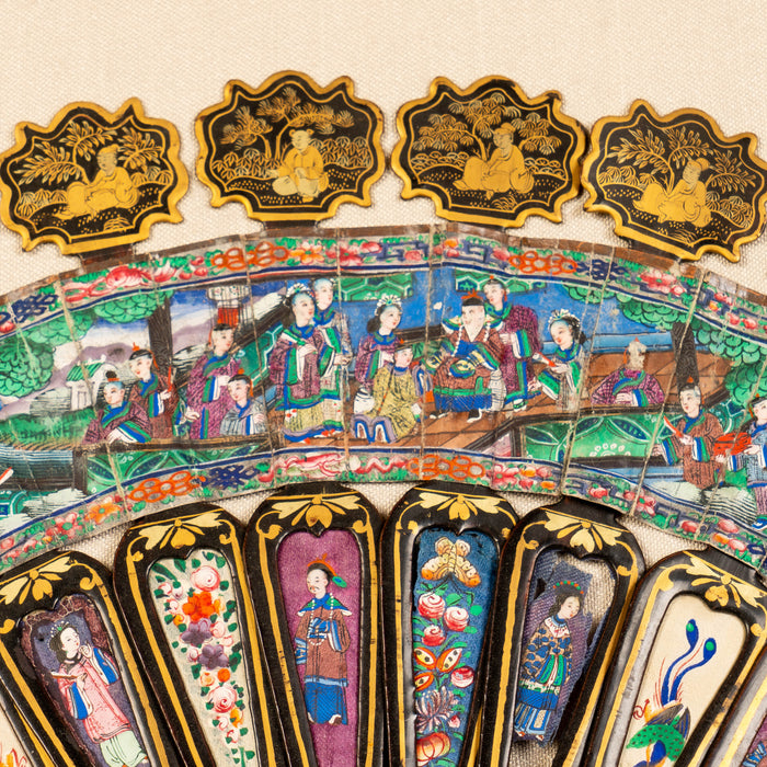 Chinese telescopic fan of gilt decorated black lacquer stays (1850's)