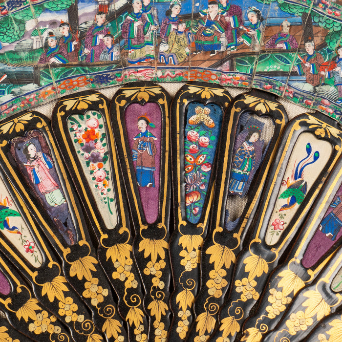 Chinese telescopic fan of gilt decorated black lacquer stays (1850's)