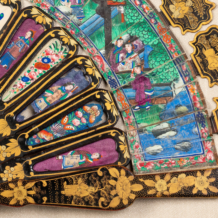 Chinese telescopic fan of gilt decorated black lacquer stays (1850's)