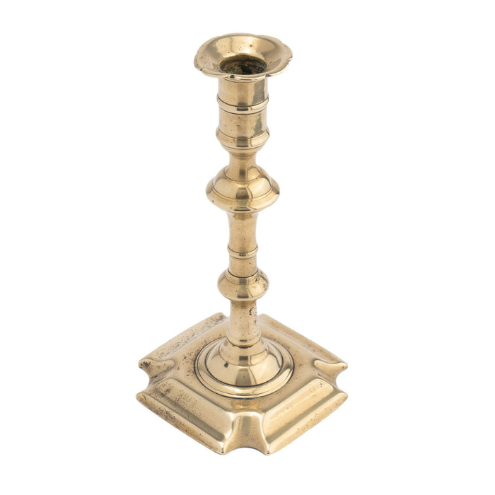 English Queen Anne cast brass baluster shaft candlestick (c. 1740-60)