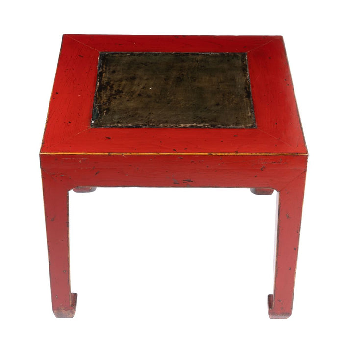 Chinese red lacquered square table fitted with inset stone top (c. 1900)