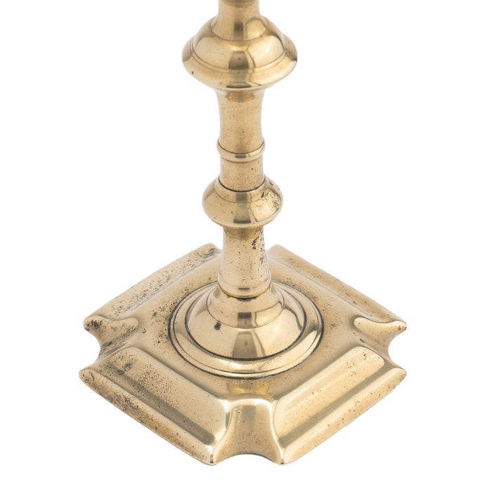 English Queen Anne cast brass baluster shaft candlestick (c. 1740-60)