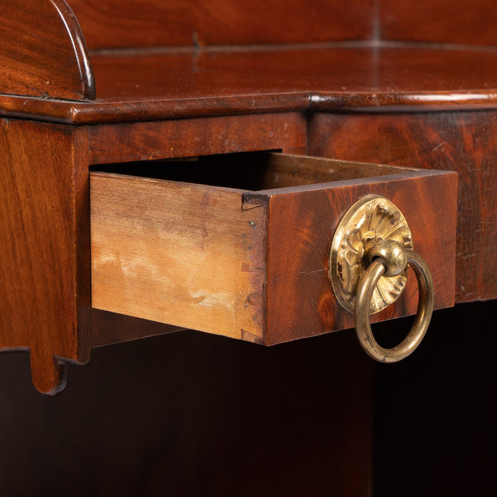 American mahogany demilune dressing stand on brass castors (c. 1830)