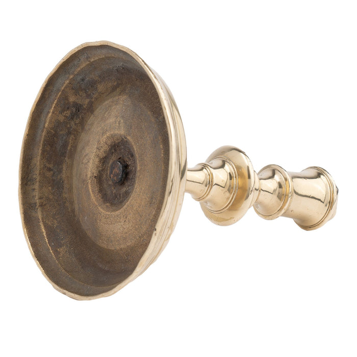 French cast brass circular base candlestick (c. 1720)