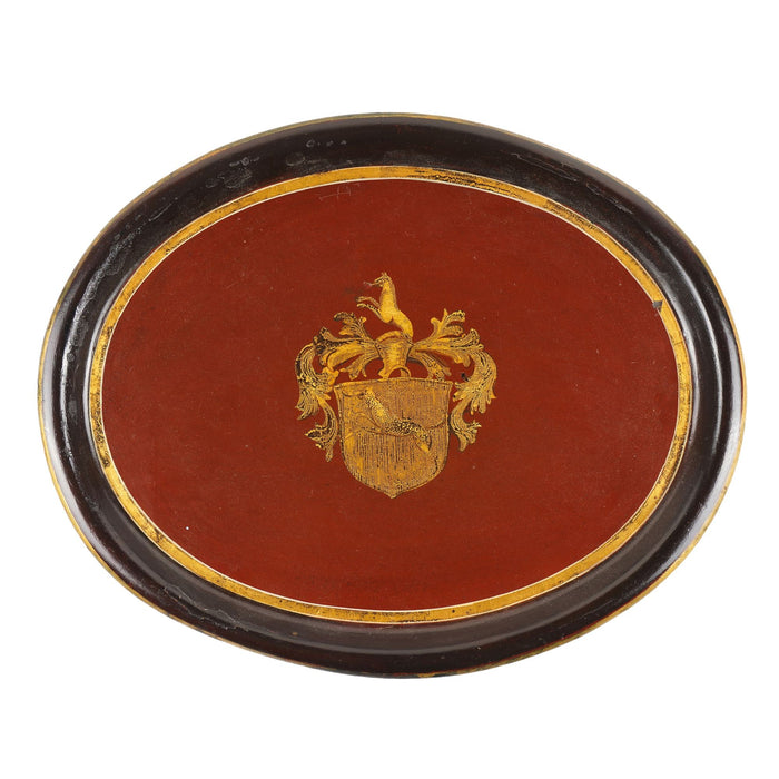 Continental oval tole tea tray with gilt armorial (1825-50)