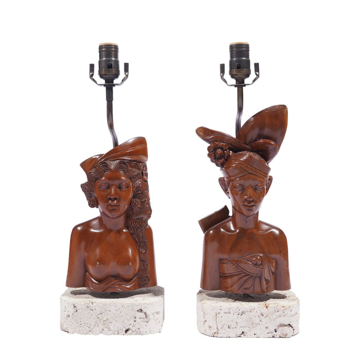 Pair of Balinese carved bust lamps mounted on cut coral bases (c. 1920-40)