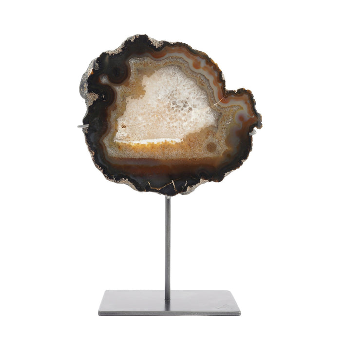 Slice cut agate geode specimen on stand