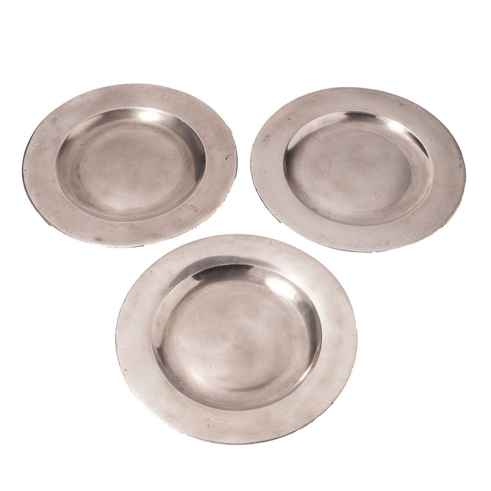 Set of three flat rim pewter plates (c. 1775-1800)