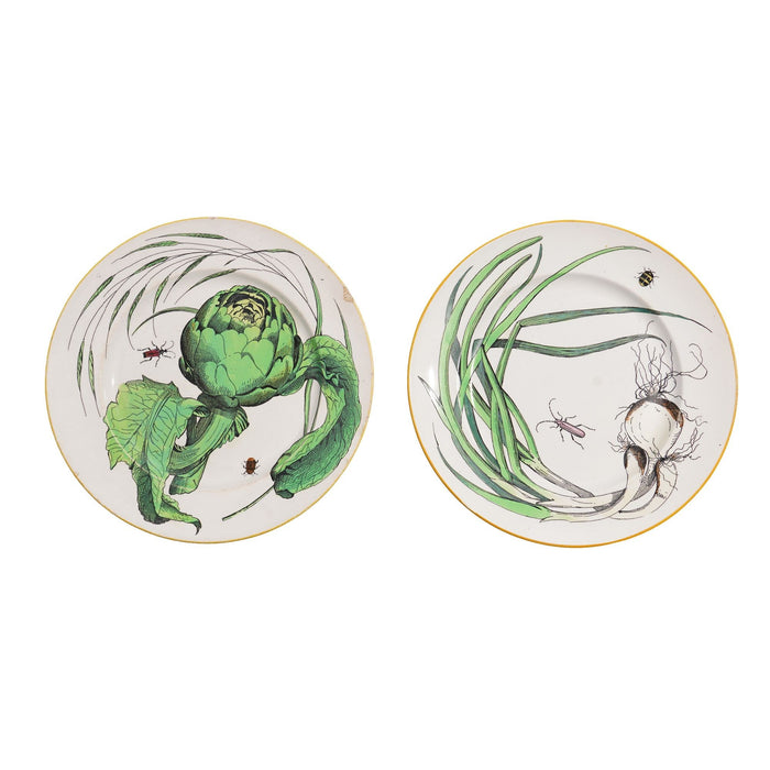 Pair of French glazed faience plates with scallions and artichokes (c. 1850's)