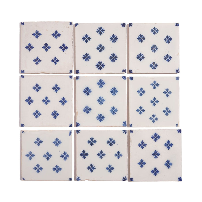 Set of 9 Delft tiles in cobalt pattern of florets (c. 1600’s)
