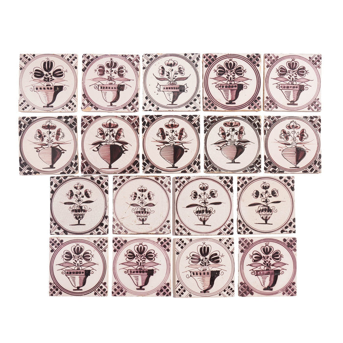 Set of 18 mulberry decorated Delft tiles (1700's)