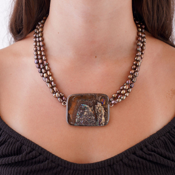 Rectangular opal pendant on a triple string of brown freshwater pearls