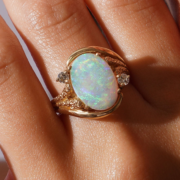 Australian opal and diamond ring in a 14k gold setting