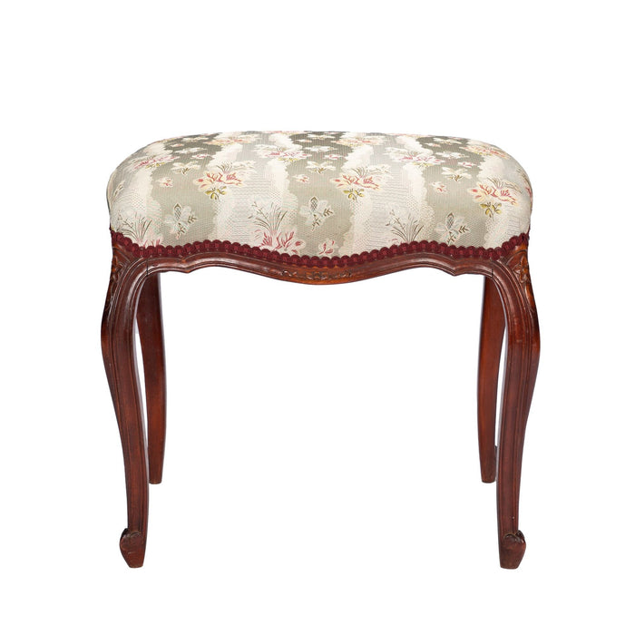 French Louis Philippe Period upholstered walnut arm chair with paired footstool (1850's)