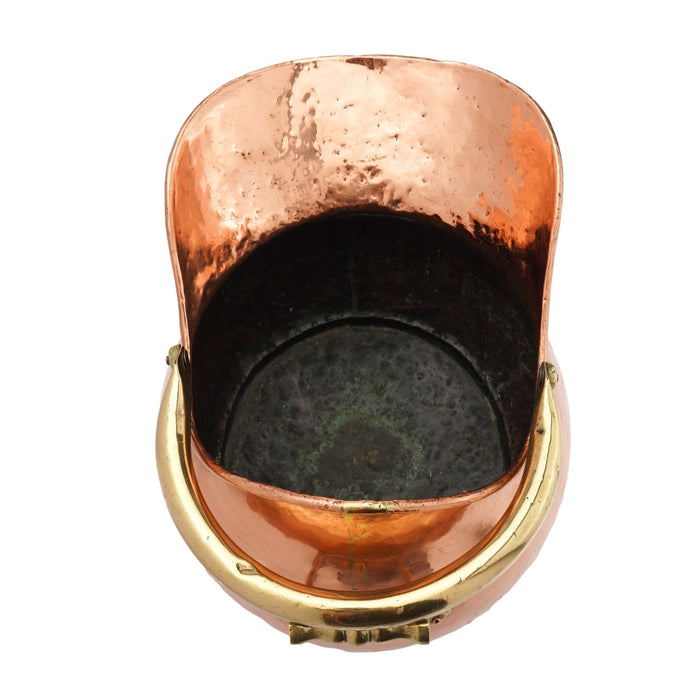 Helmet shaped copper coal hod on a circular footed base (1800's)