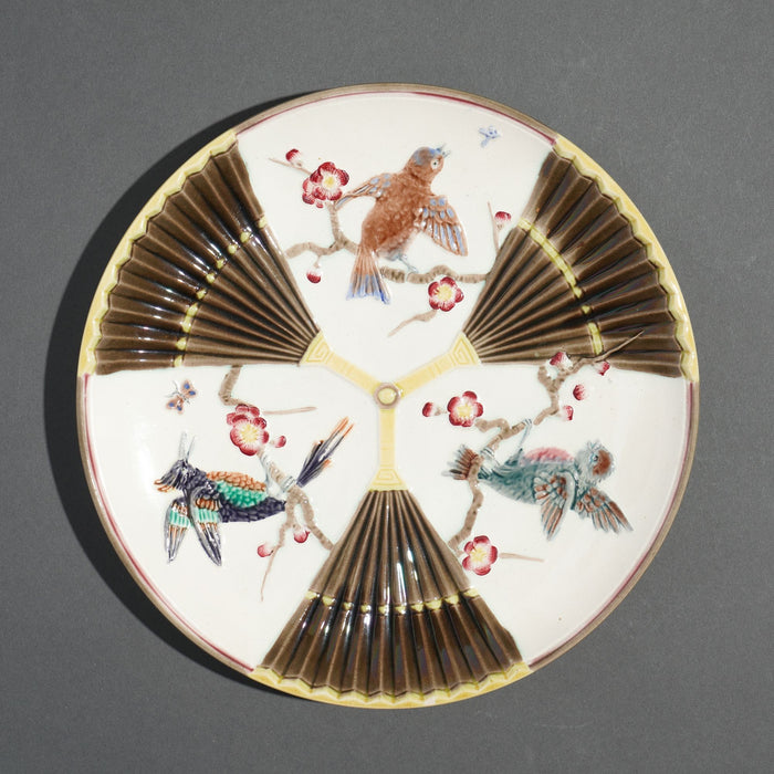 Polychrome glazed Argenta majolica plate by Wedgwood (c. 1884)