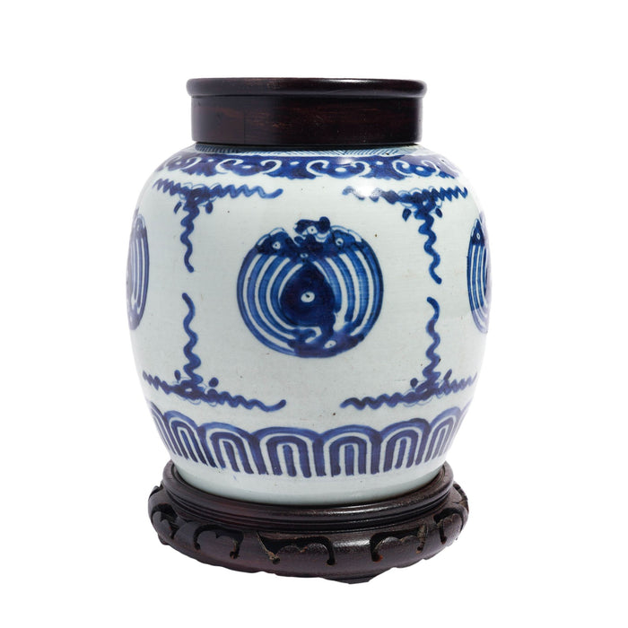 Chinese ceramic ginger jar on wood stand (c. 1661 -1722)