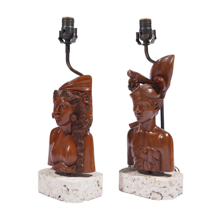 Pair of Balinese carved bust lamps mounted on cut coral bases (c. 1920-40)