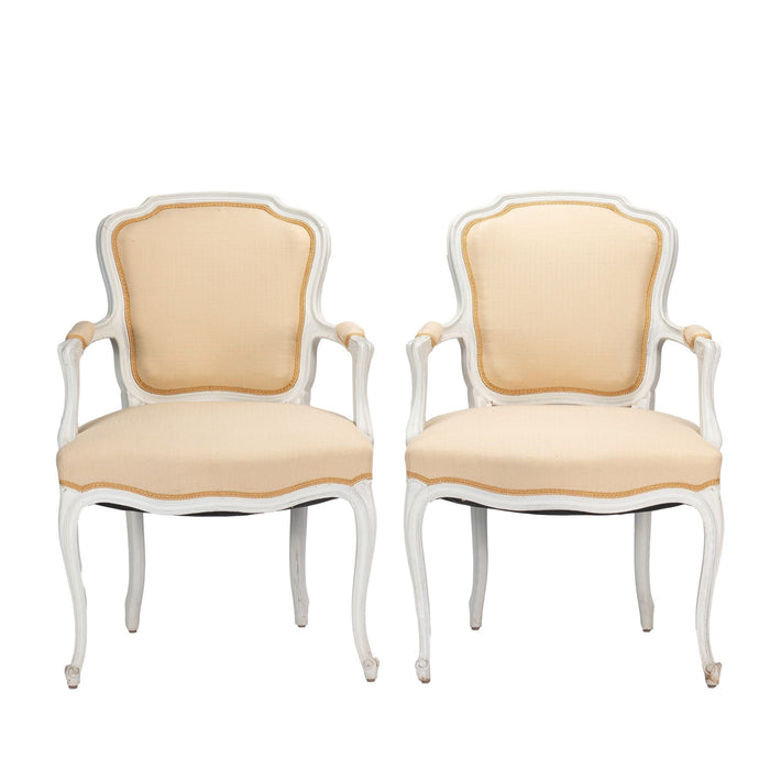 Pair of Louis XVI style painted & upholstered fauteuil (1910-30)