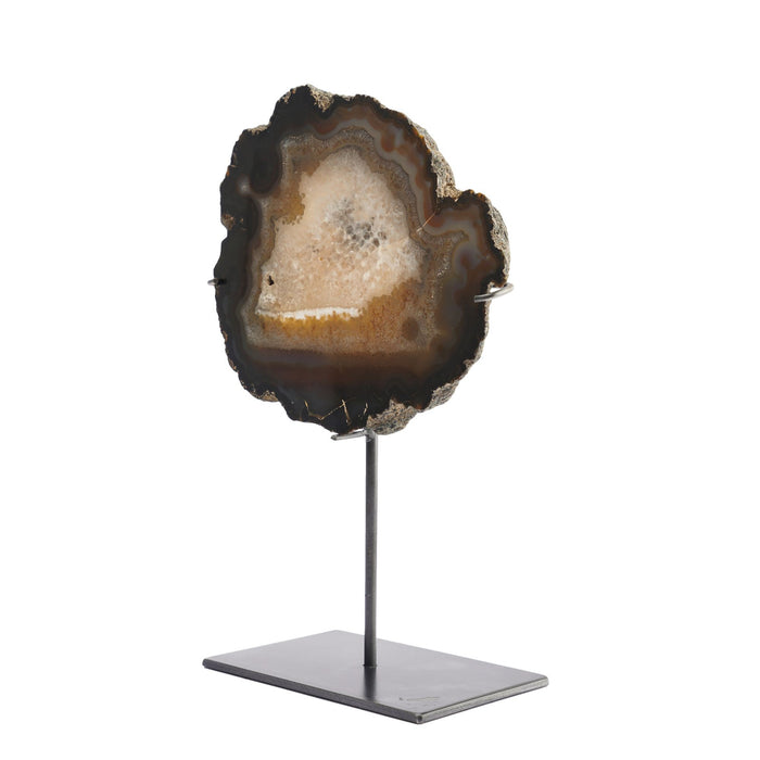 Slice cut agate geode specimen on stand