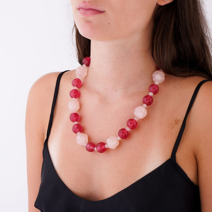 Necklace of Raspberry Beijing Glass and knot carved rose quartz (c. 1900-1925)