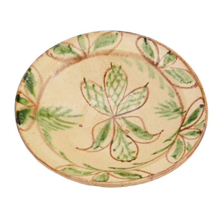 Cream color redware footed bowl with green tracery leaf decoration (1800's)